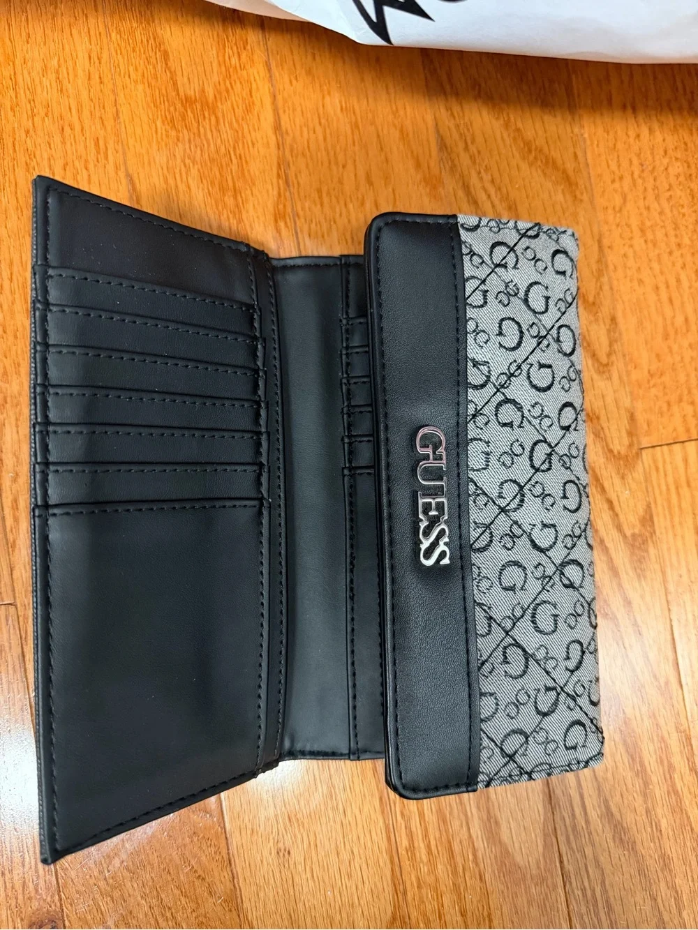 GUESS Gray Monogram and Black Trim Fold Wallet